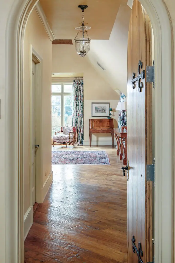 The house has four bedrooms, and an additional guest house. 