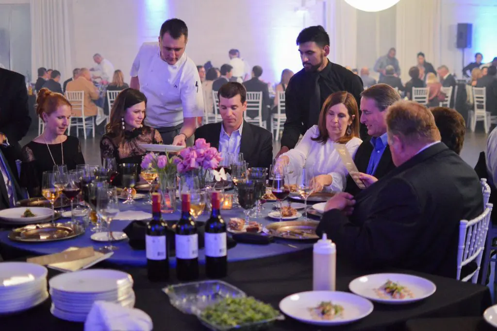 Chef Jacob Williamson serves guests