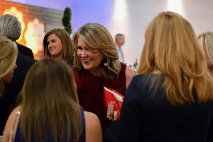 Diana Crawford greets guests