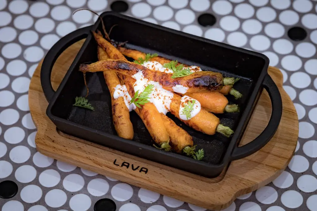 The Moroccan carrots with turmeric, cumin and curry at Feges BBQ in Houston are a hit. 