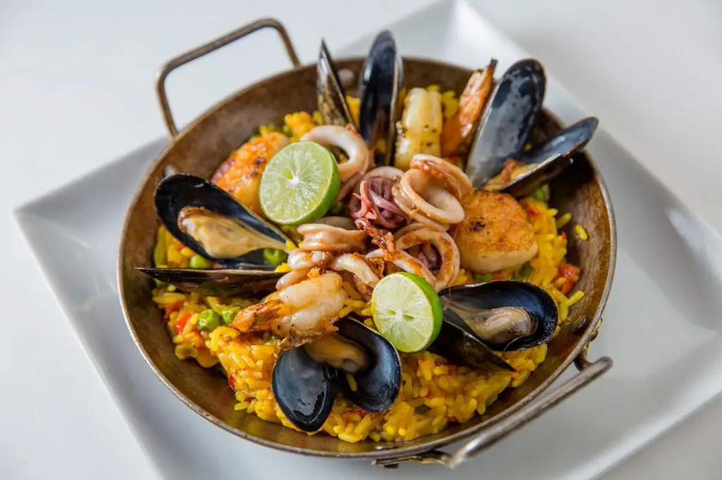 Seafood paella at Fig & Olive represents the flavors of Spain. 