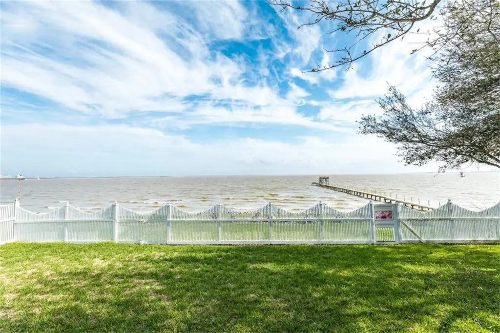 The seaside summer home has a beautiful view of the bay. 