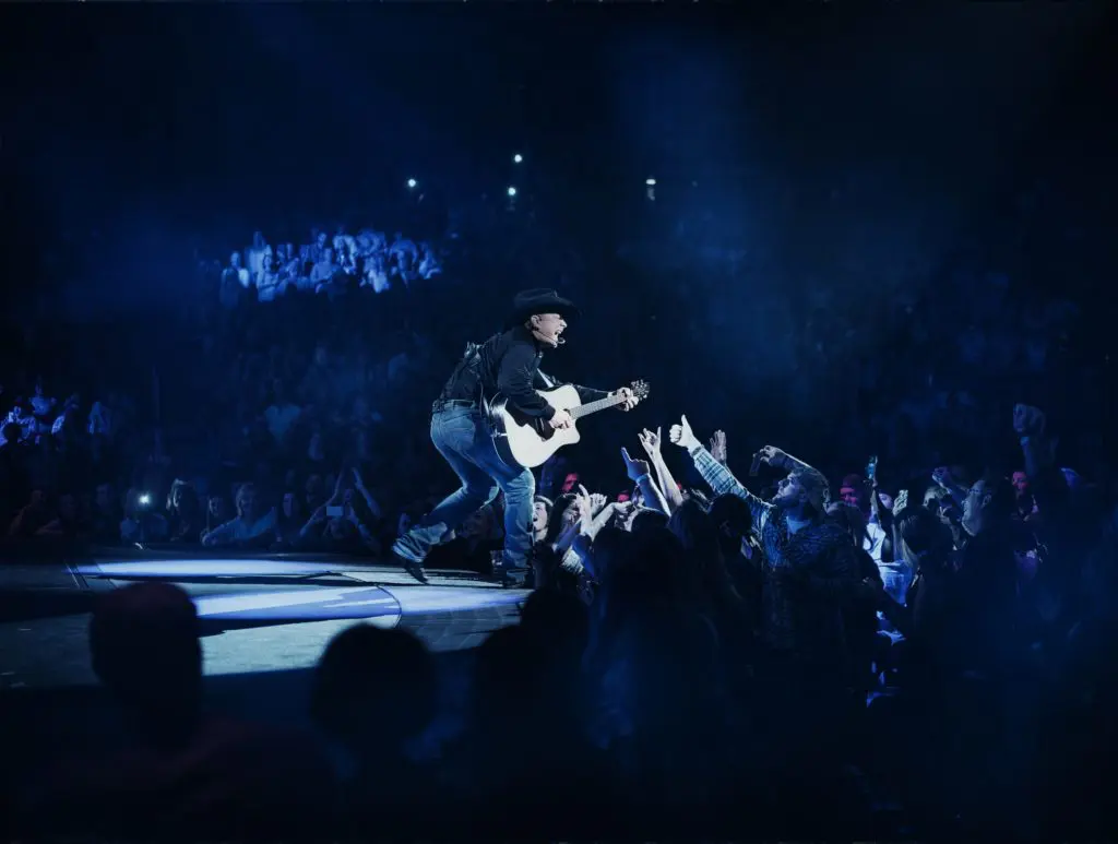 Garth Brooks Pulls Off Rock Star Moves at Rodeo, Uses Surprise Guest to Shock Record Crowd: Brooks is no George Strait, But he Has Plenty of Springsteen in Him
