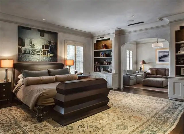 The master suite includes a private sitting area and his-and-hers bathrooms. 