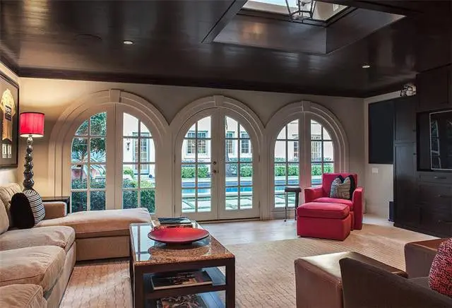 The pool house has its own kitchenette and living area. 