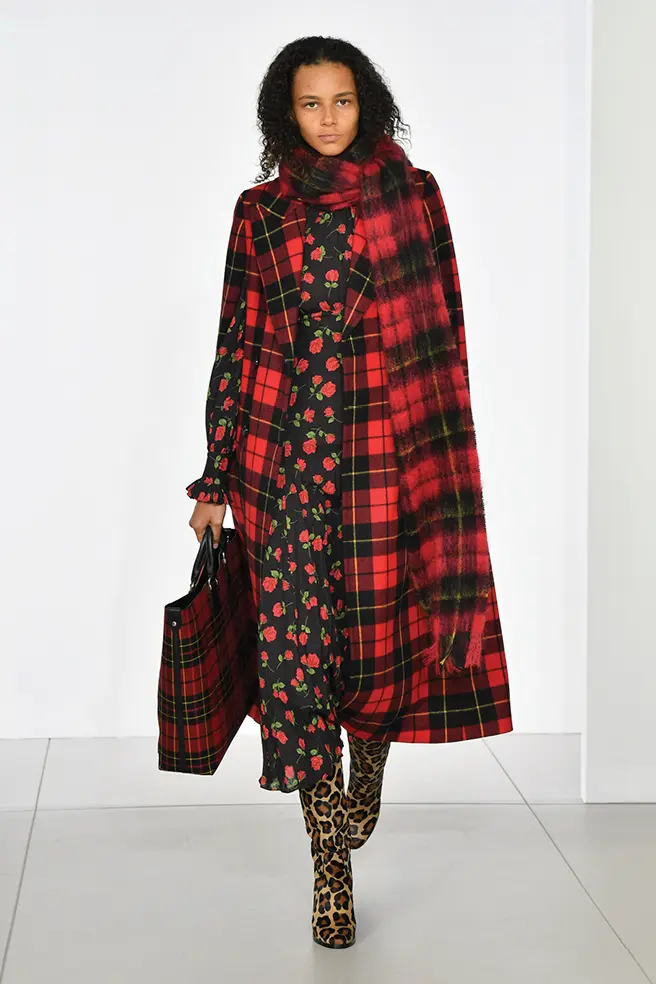 Michael Kors tartan cape and scarf, floral dress, leopard pattern boots.
