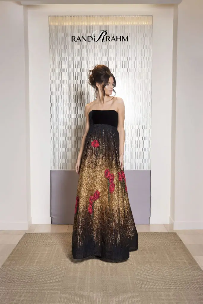 Randi Rahm "Passion Tuleh" strapless evening gown with embroidered floral detail.