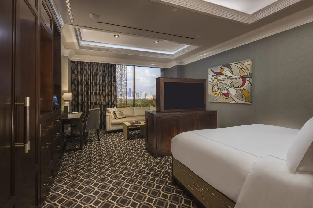 The Post Oak's standard rooms come with three TVs and plenty of plush touches.