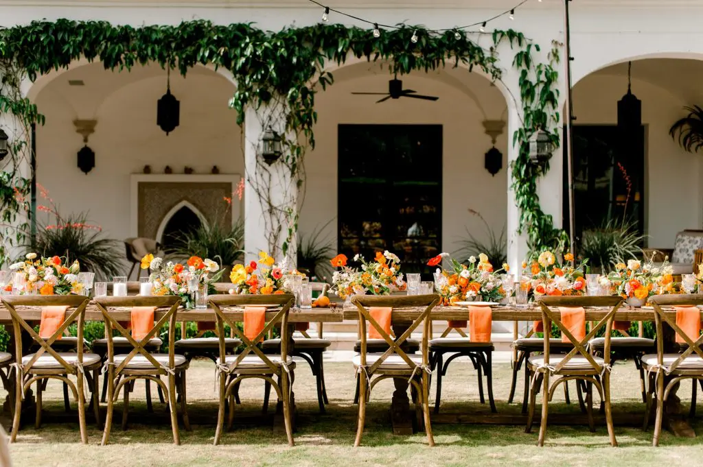 Tablescape at Goop x Cointreau dinner, featuring Abelia Floral Studio flowers and Serena & Lily decor