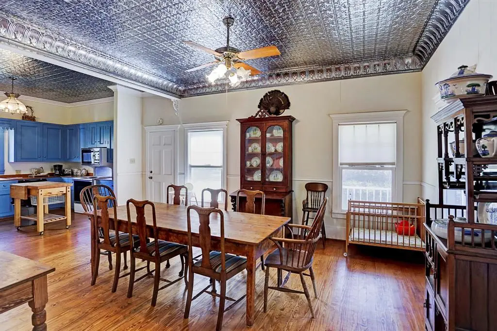 This dining room lets in lots of natural light. 