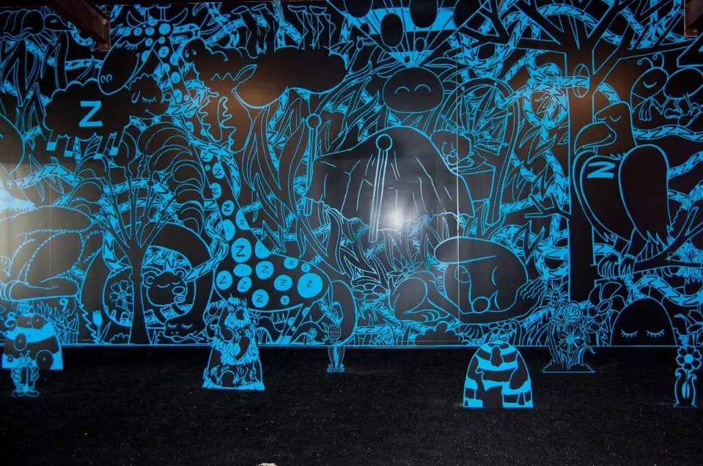 The night mural of Destination Mound Town has its own distinct vibe. (Photo by Megan Badger.)