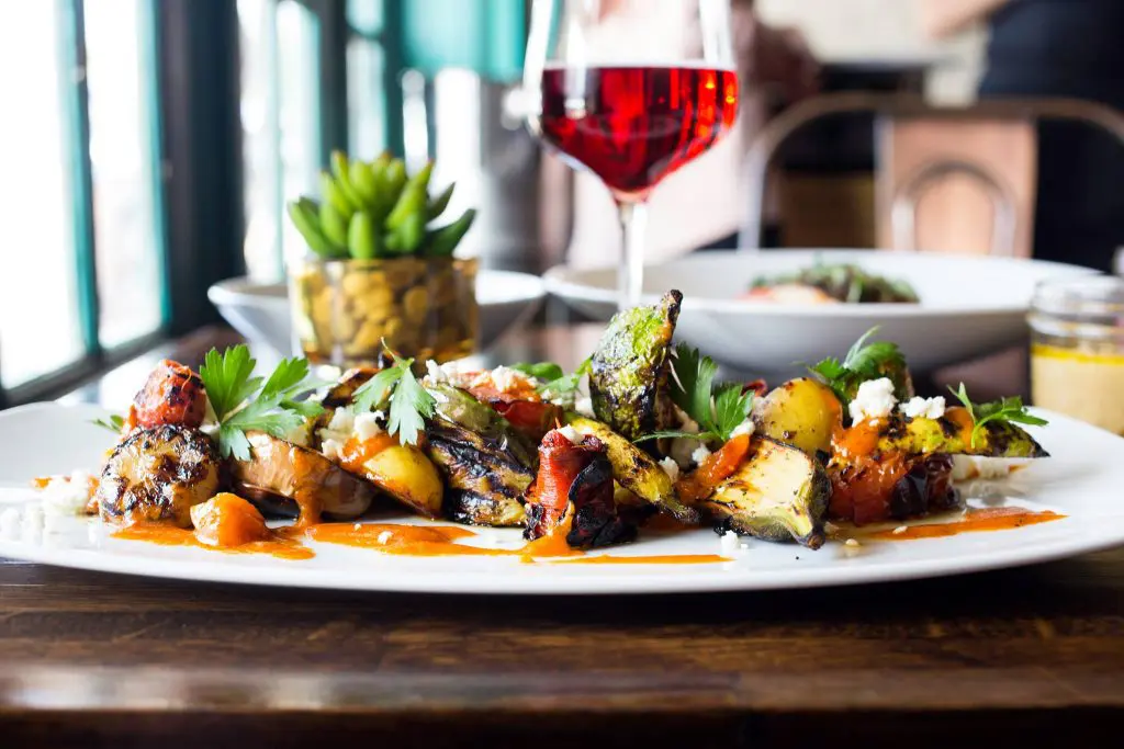 Helen Greek Food and Wine's Grilled Briam comes with baby squash, eggplant and more in a pickled tomato vinaigrette. (Photo by Helen Greek Food and Wine.)