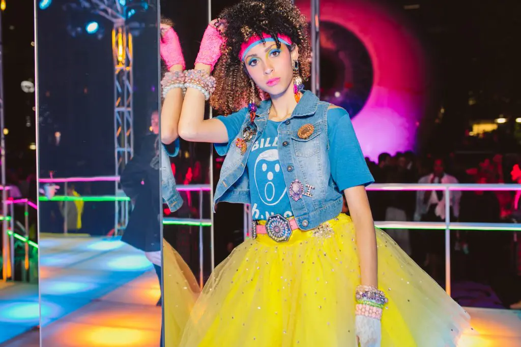 Models dressed in '80s costumes mingled throughout the party.