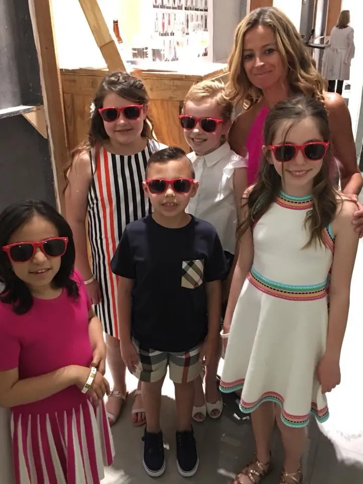 Mini models Elizabeth, Emily, Hannah, Jasmine and Jace with Michelle Smith backstage at Legacy of Love. 