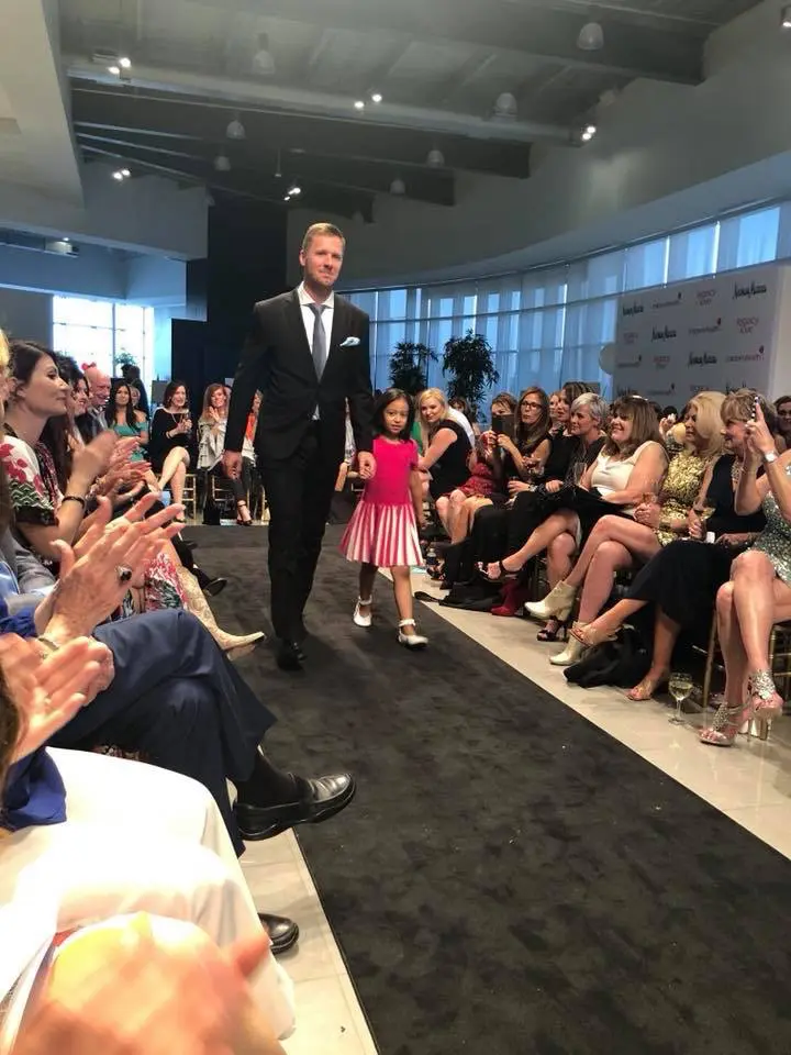 Dallas Stars Defender, Marc Methot escorting Elizabeth