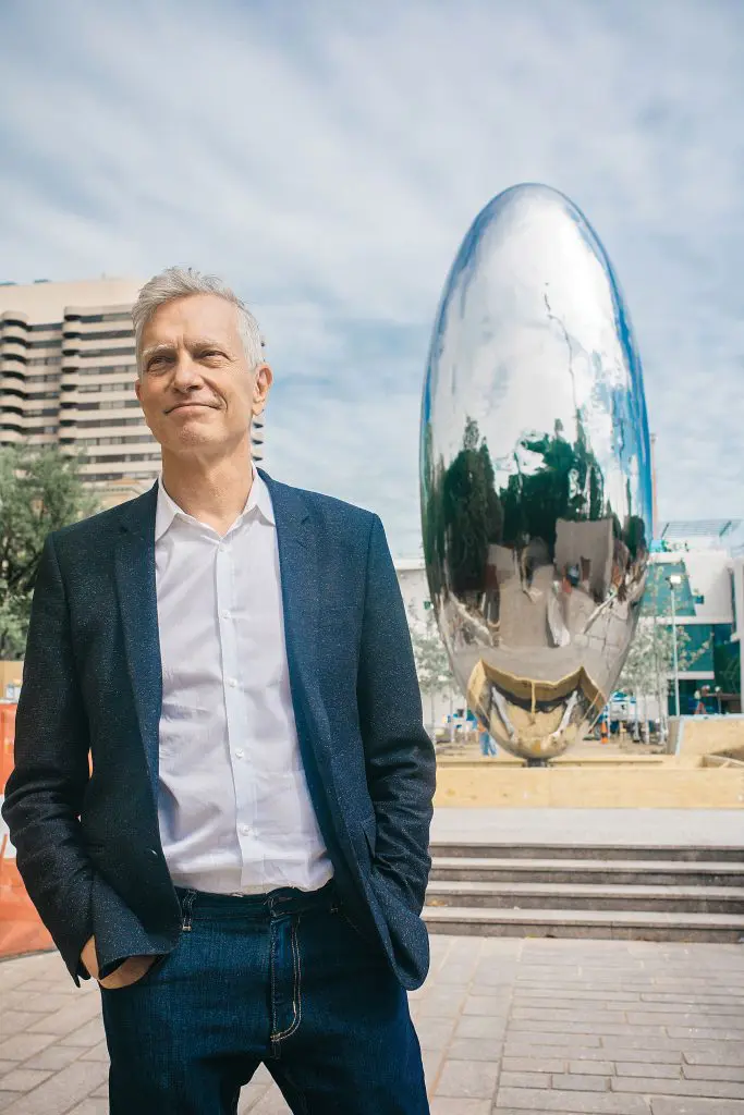 Glassell director Joe Havel with Anish Kapoor’s "Cloud Column," 1998-2006 (Portrait Jay Tovar)