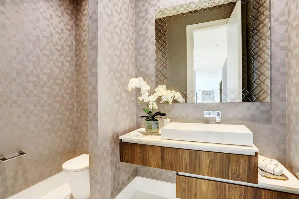 This powder room is bright and cheerful. 