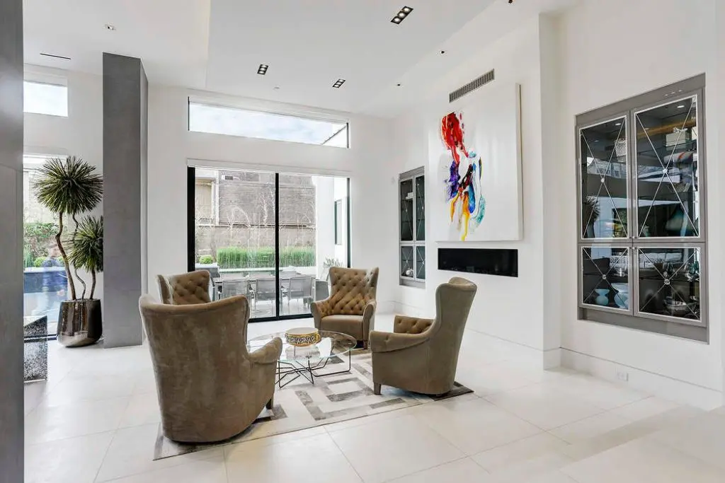 The modern fire place is perfect for warming up winter evenings. 