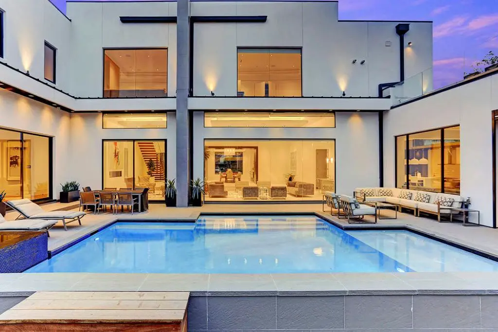 Night swims give an incredible view of the home's contemporary architecture. 