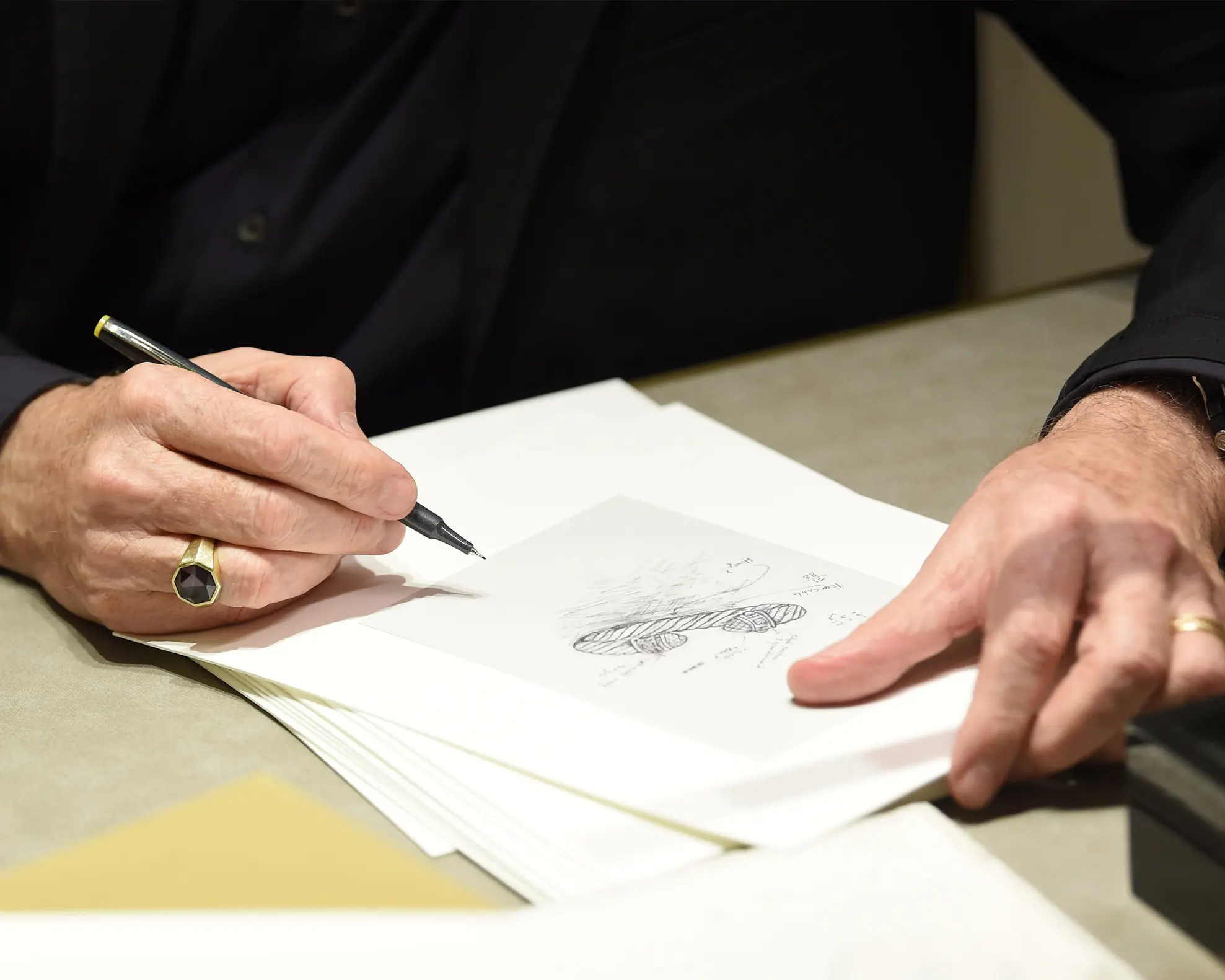 David Yurman with a sketch of his iconic cable bracelet