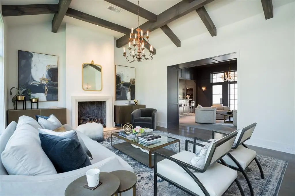 Wide plank white oak floors give fresh character to the formal living room. 