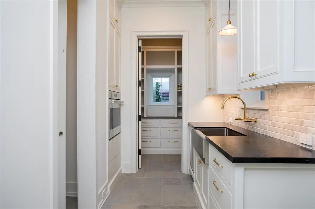 The scullery fits all needs with a wolf convection oven and warming drawer. 