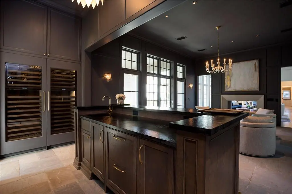 The wine room has a sonic ice maker and sub-zero full height wine refrigerators. 