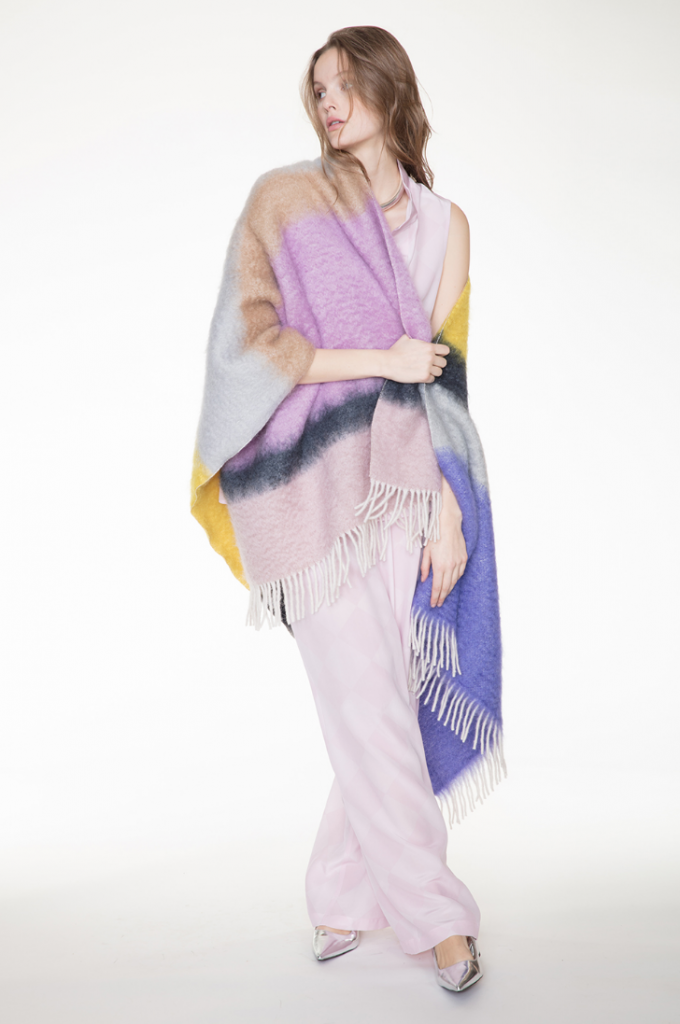 Daniel Wingate pale purple jumpsuit and multicolored poncho