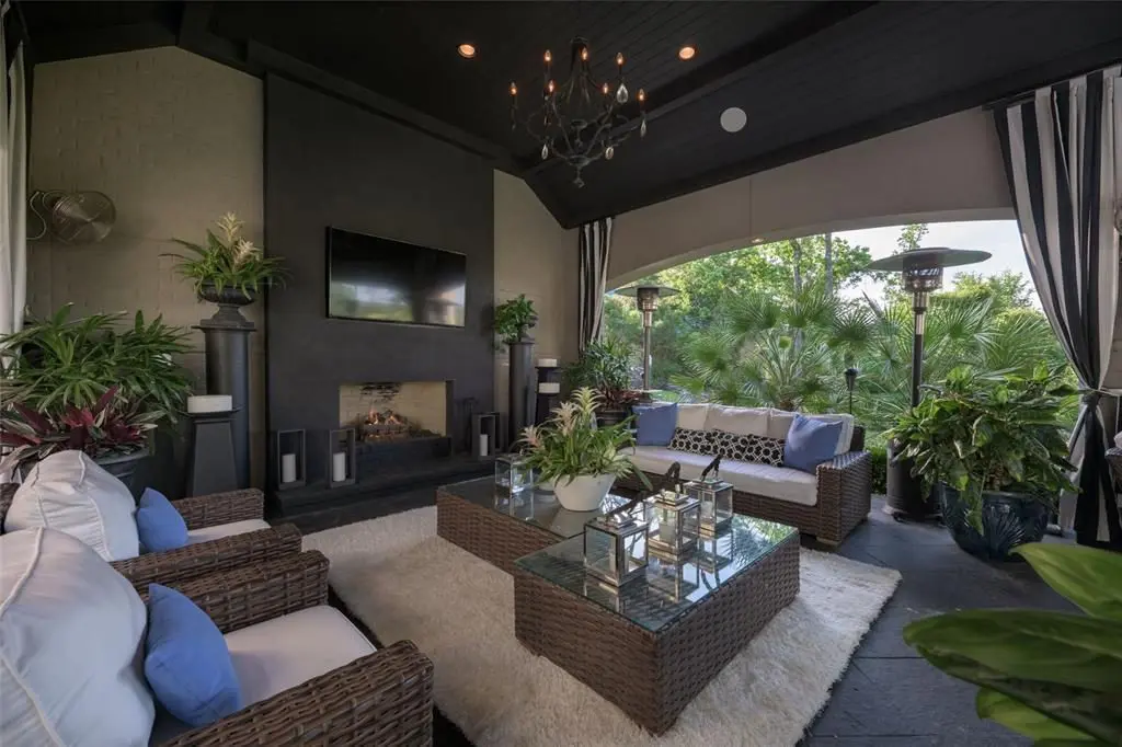 The covered veranda is perfect for spring evenings. 