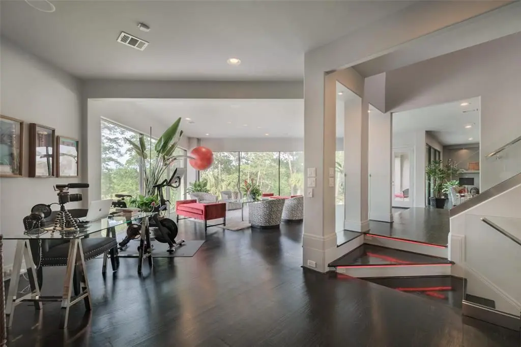 This surprising home office, actually space, resides in the middle of a second-floor open-plan home.