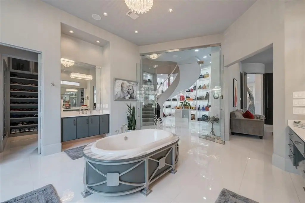 The master suite's bath looks into the epic closet. 