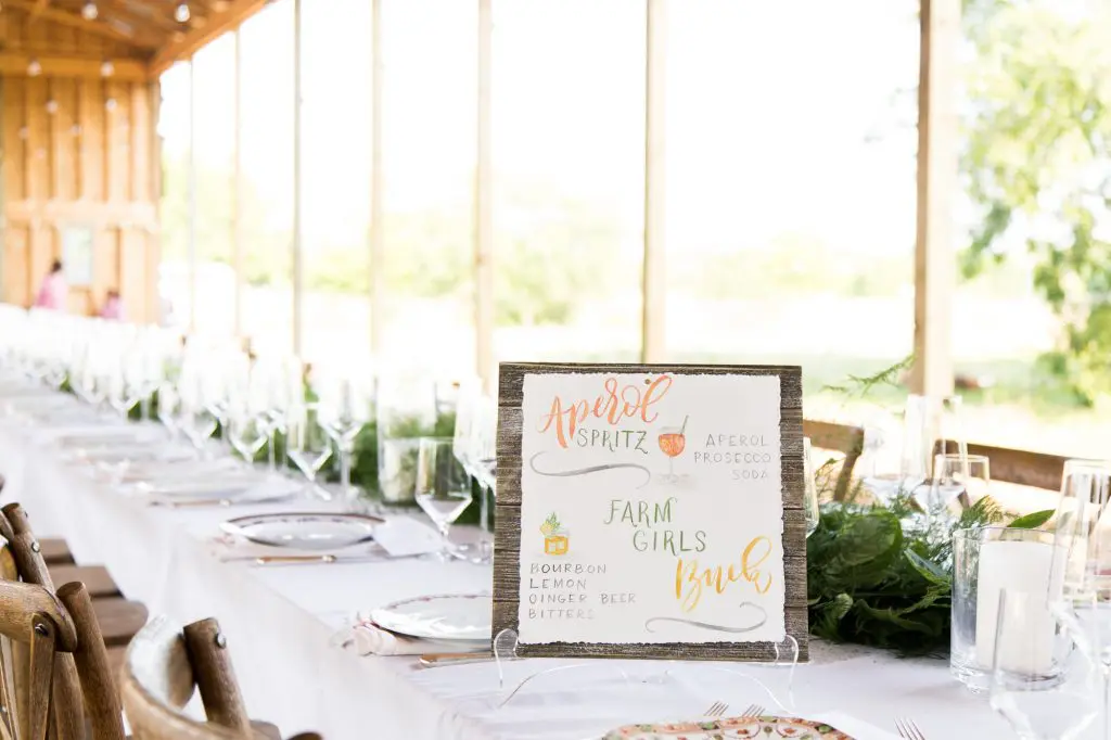 Two refreshing specialty cocktails were served to guests upon arrival. Sign by Nancy B. Creative.