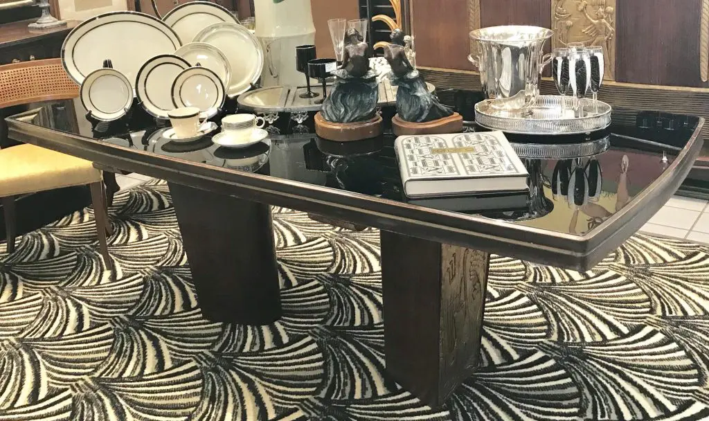 Consorzio Esposizione Mobili Cantu Vittorio Dassi dining table, among the treasures being sold to benefit the estate of Mickey Rosmarin. As he was a tastemaker with his founding of Tootsies in 1974, Rosmarin's eye for Deco and moderne furniture was equally noteworthy. Besides significant furnishings, the public will have a chance to acquire objects, books, and ephemera owned by the late, larger-than-life retail legend. 