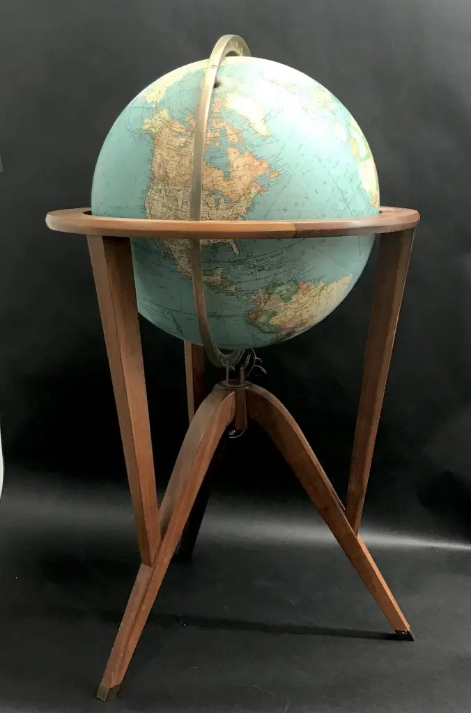 This collectible globe on a stand by Edward Wormley for Dunbar is among the mid-century finds at the Mickey Rosmarin estate sale. 