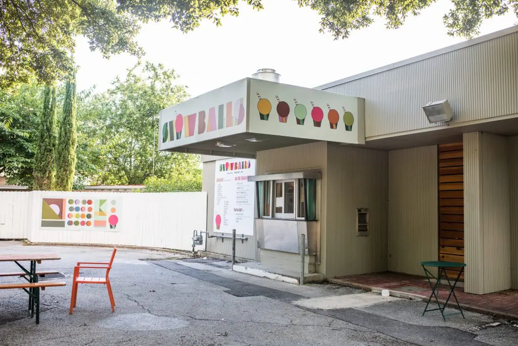 The old bank teller window has been brightly revamped to serve up sweet and icy treats
