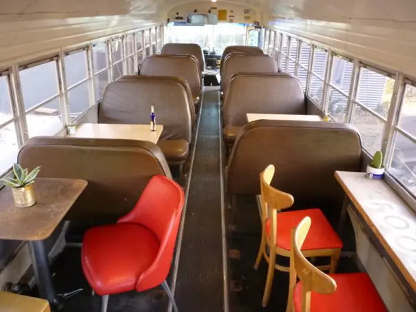 Food Shark invites you to chow down in an old school bus. 