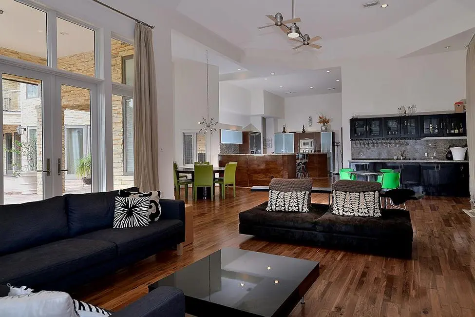 The home is largely open air, with many rooms connected through open doorways. 