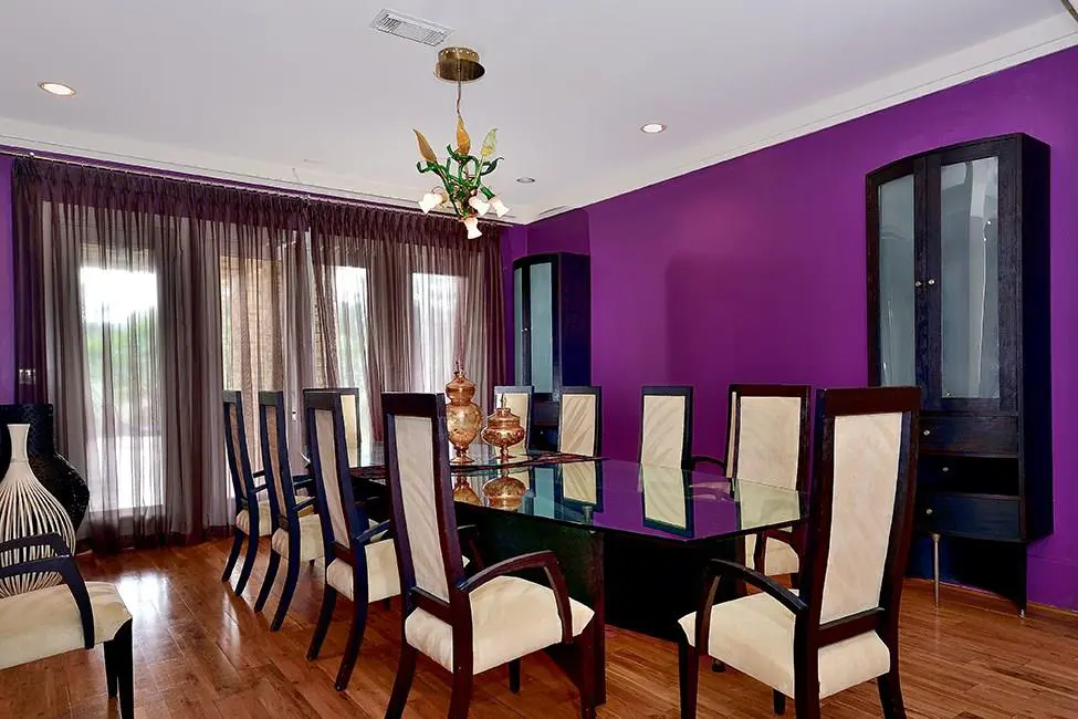 Tall floor-to-ceiling windows keep the dining rooms light and breezy. 