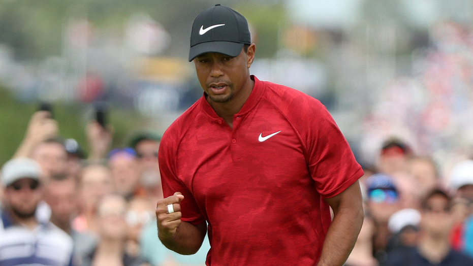 Tiger Woods found some of his old magic at the British Open. Then, he showed a different side with his new girlfriend and his kids.