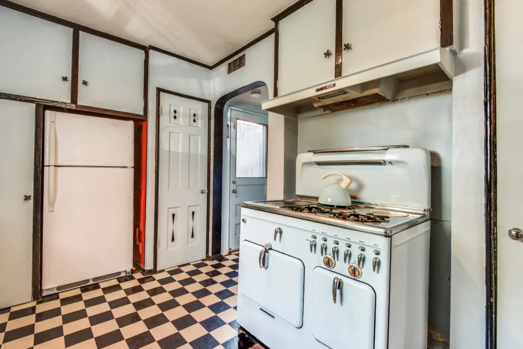 Downstairs kitchen of the duplex on University Blvd. Courtesy Ebby Halliday Realtors 