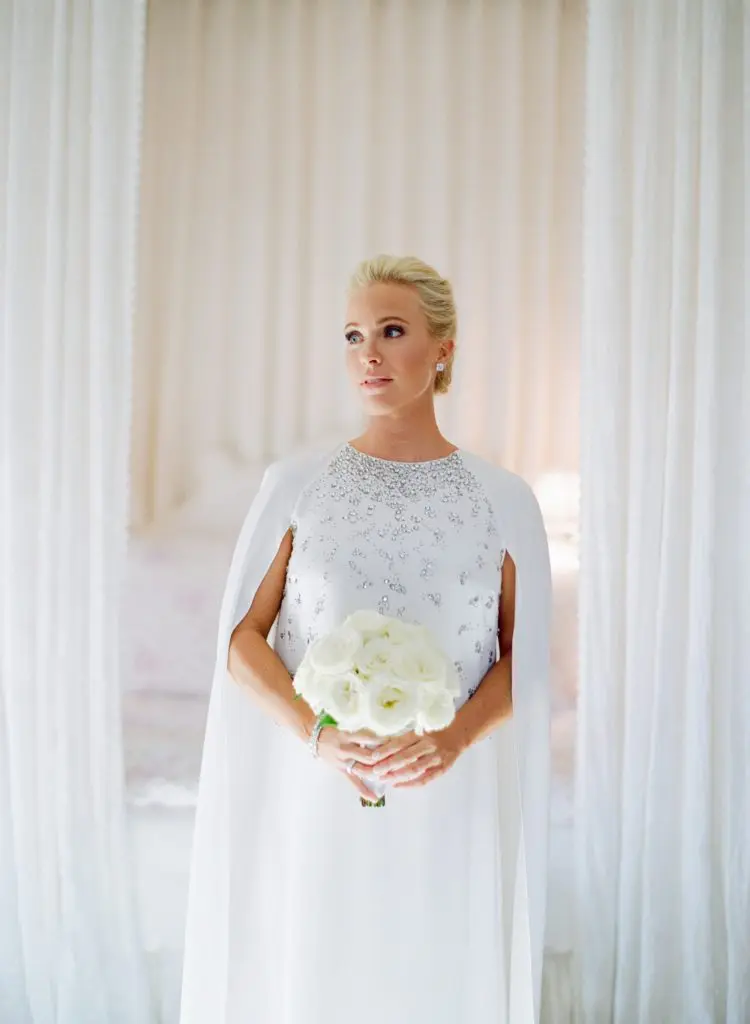 Ashley Pittman's mom found her nontraditional caped Oscar de la Renta column gown a couple days before the wedding. Photos by Jose Villa. (Photo by Jose Villa)
