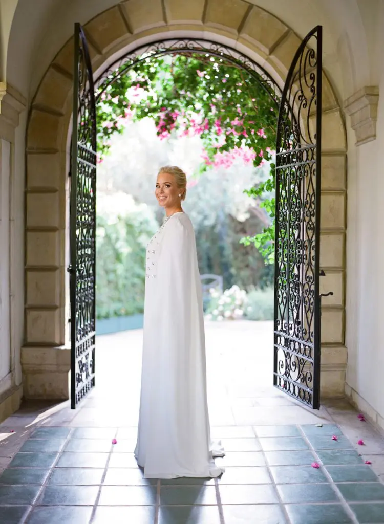 Ashley Pittman chose to switch her gown last minute to the nontraditional caped Oscar de la Renta column gown.
