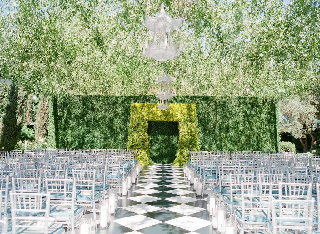 The ceremony arch was covered in stunning yellow solidago, a native California wildflower.