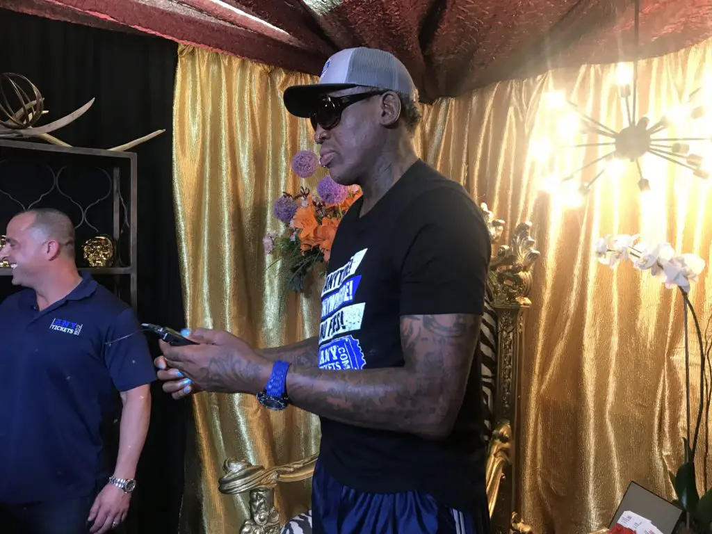 Dennis Rodman still uses a flip phone. No, really.