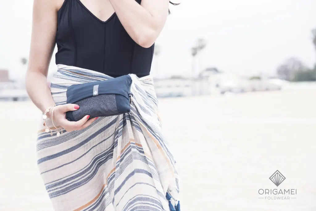 The KIKU dress can easily transform into a clutch