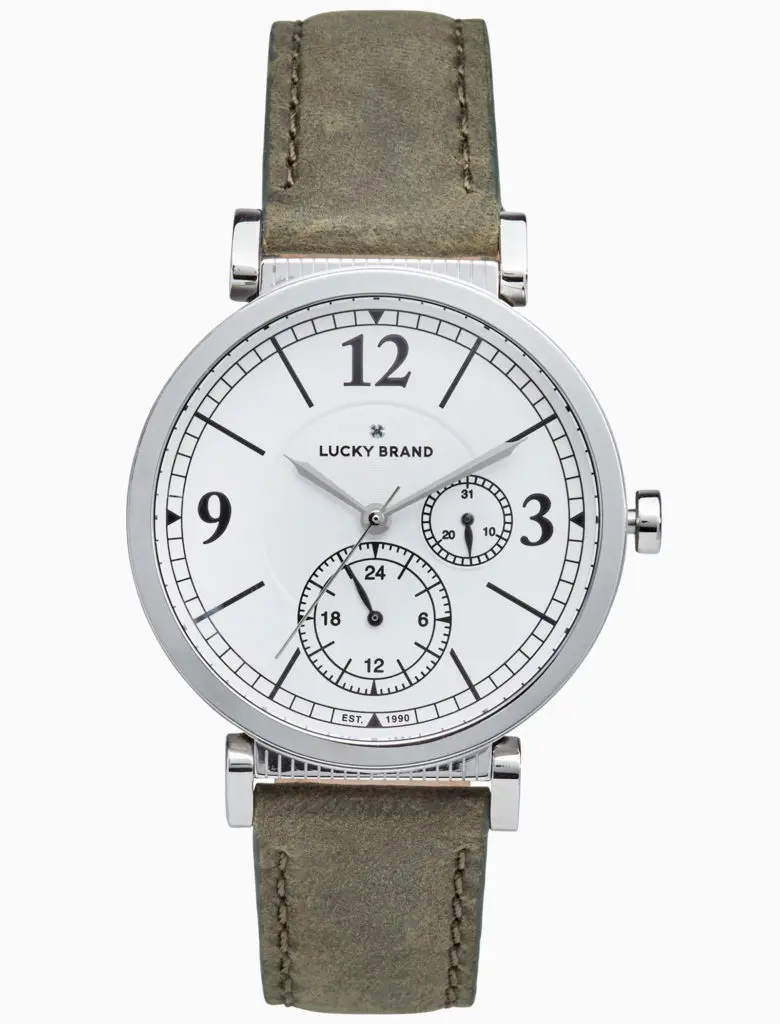 A sleek white face with a worn-in green band, adding the vintage spirit