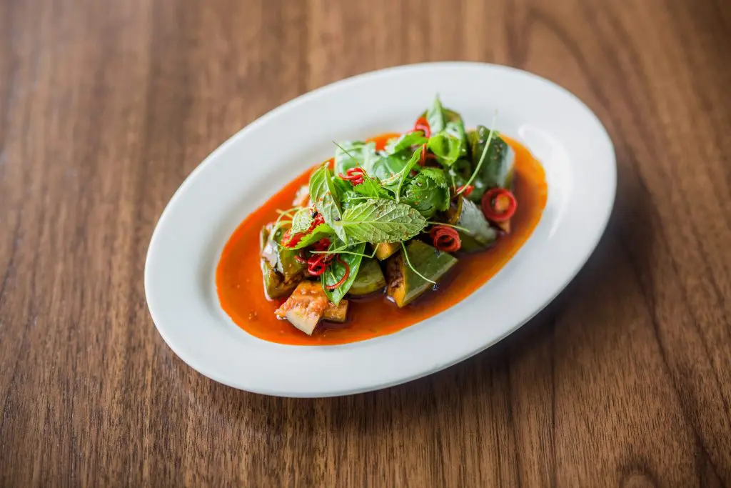 Smacked cucumbers with chili oil, black vinegar, and sesame