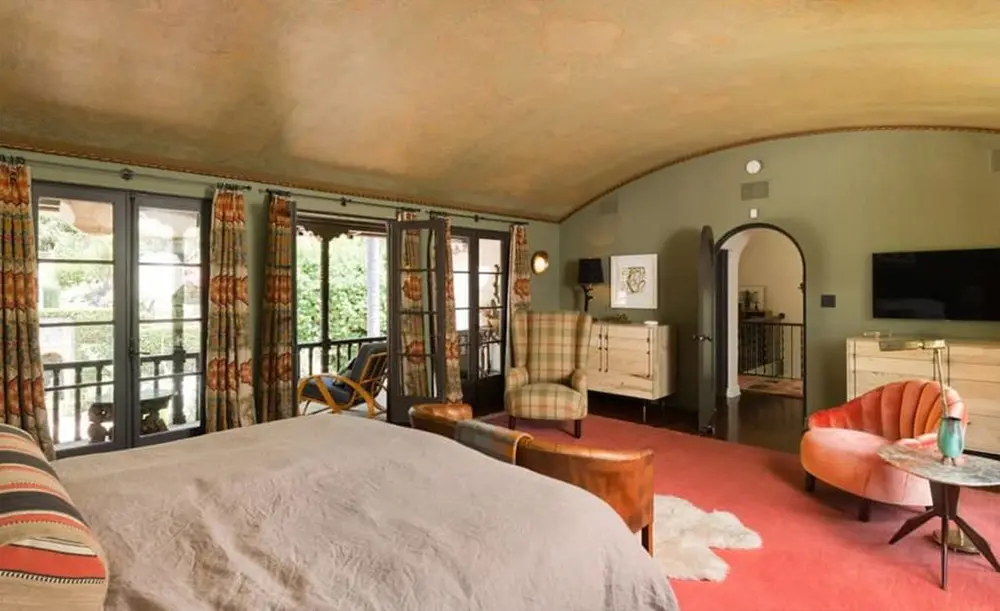 The master suite is warm and welcoming with plenty of natural light. 