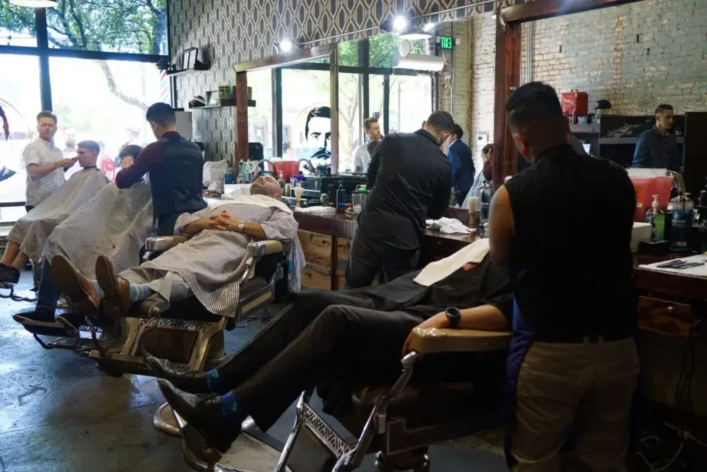High & Tight is a barbershop in the front and party bar with live music in the back. 