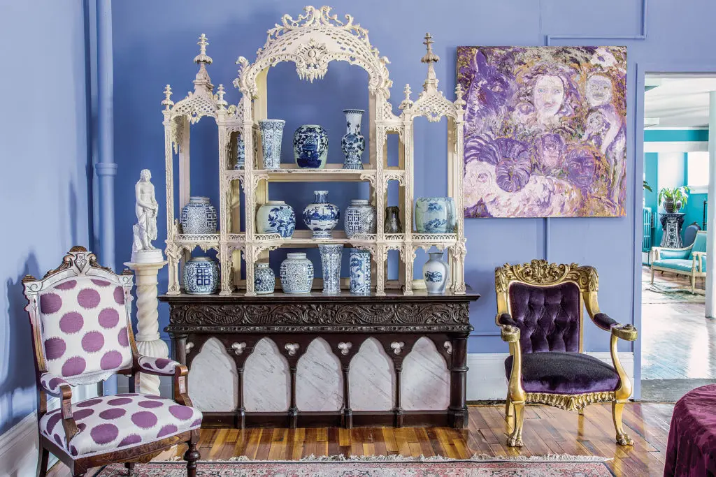 A Slonem trademark is the artist-turned-preservationist's bold use of color. Here, lavender forms a backdrop for a lacy Georgian étagère atop a Gothic chest. (Photo Marco Ricca)